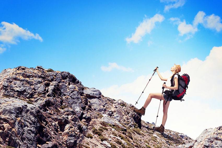 A woman hiking on a mountain