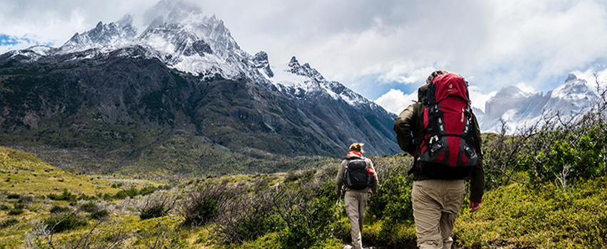 Two people hiking in the mountains