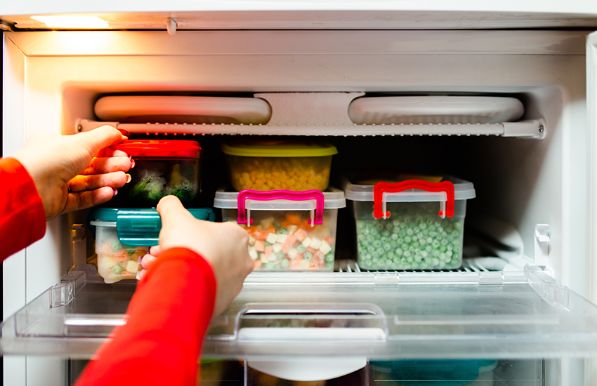 A refrigerator with five dishes