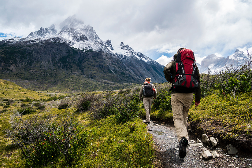 Two people hiking in the mountains