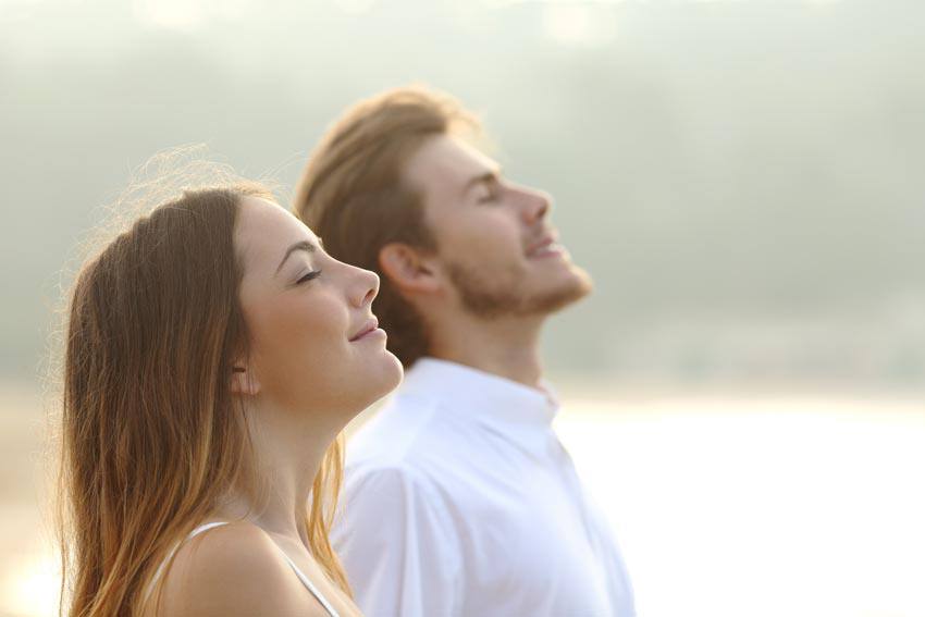 Two people enjoying the air outside