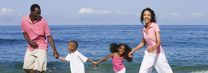 Family on a trip to the water's edge