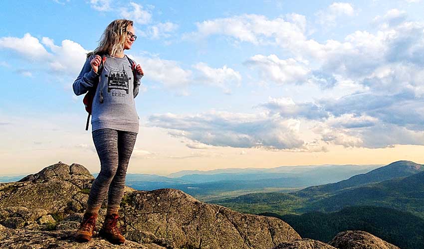 A lady hiking in the mountains