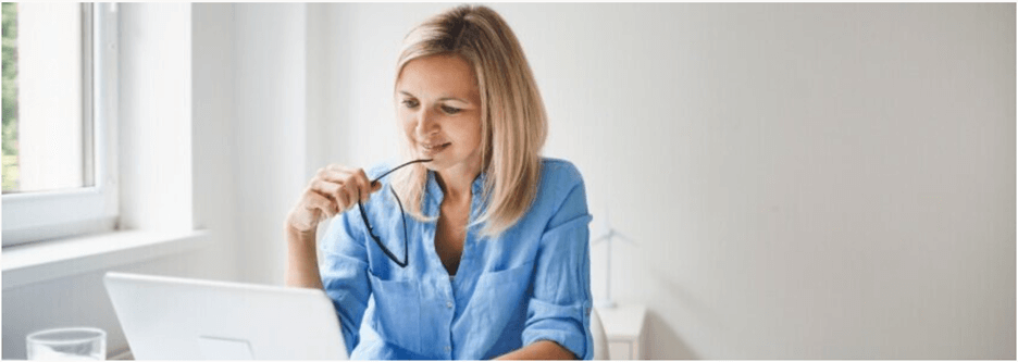 Woman watching her laptop