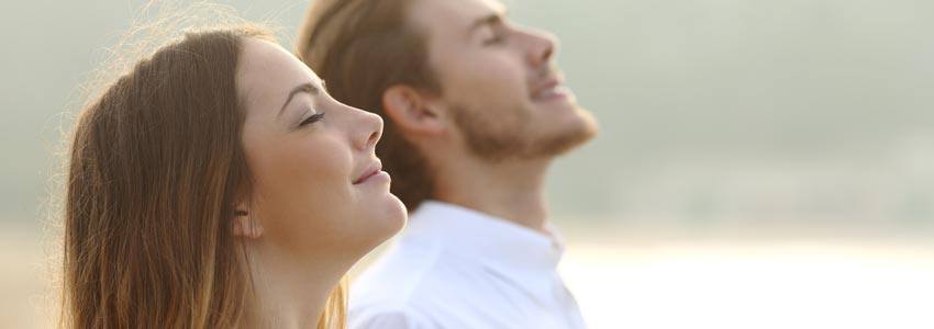 Two people enjoying the air outside