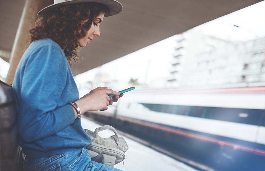 Girl watching at her mobile phone