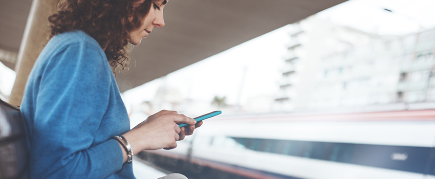 Girl watching at her mobile phone