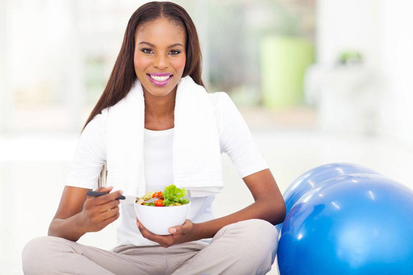 A lady eats a healthy meal